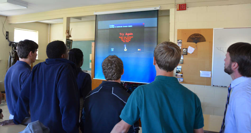 Students working with AeroSIM-RC simulator
